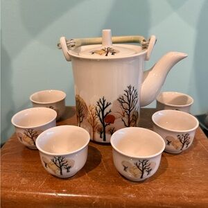 Vintage Stoneware Sake or Tea set includes pot and six cups.